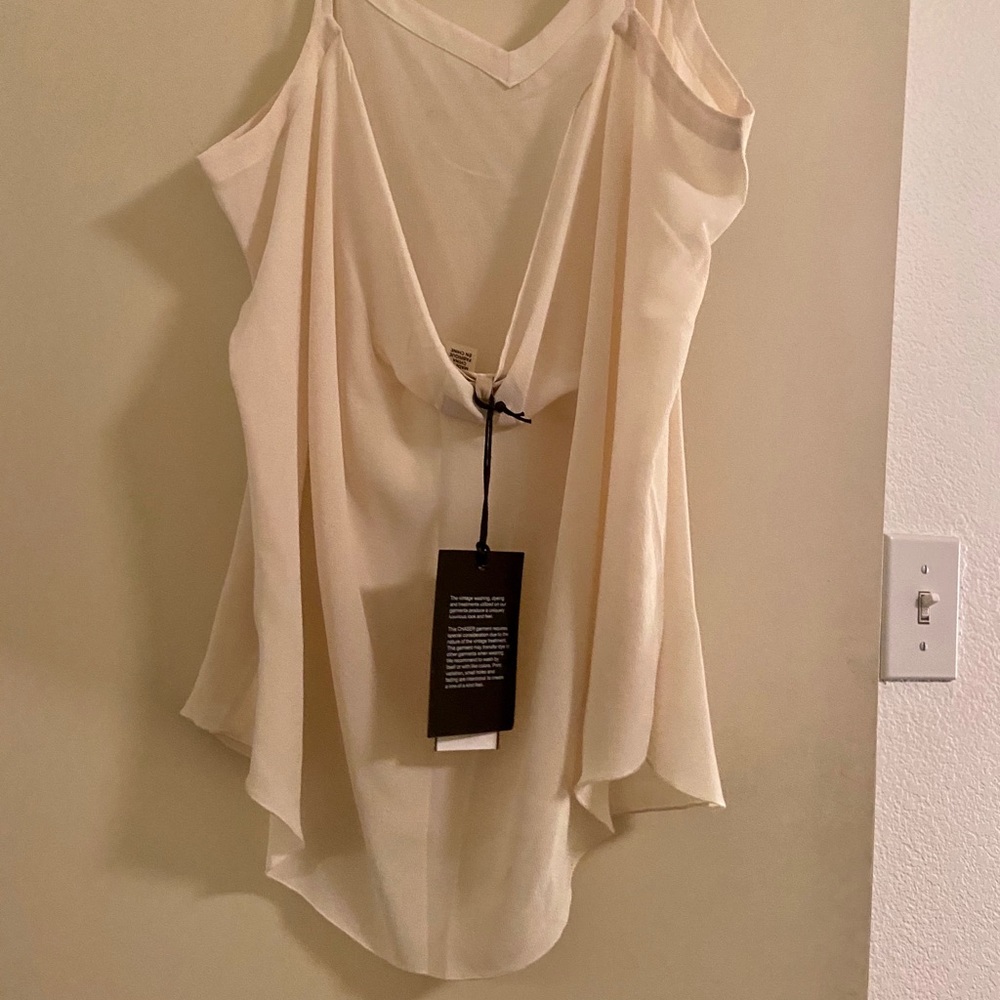 Brand new sleek Chaser brand off white tank